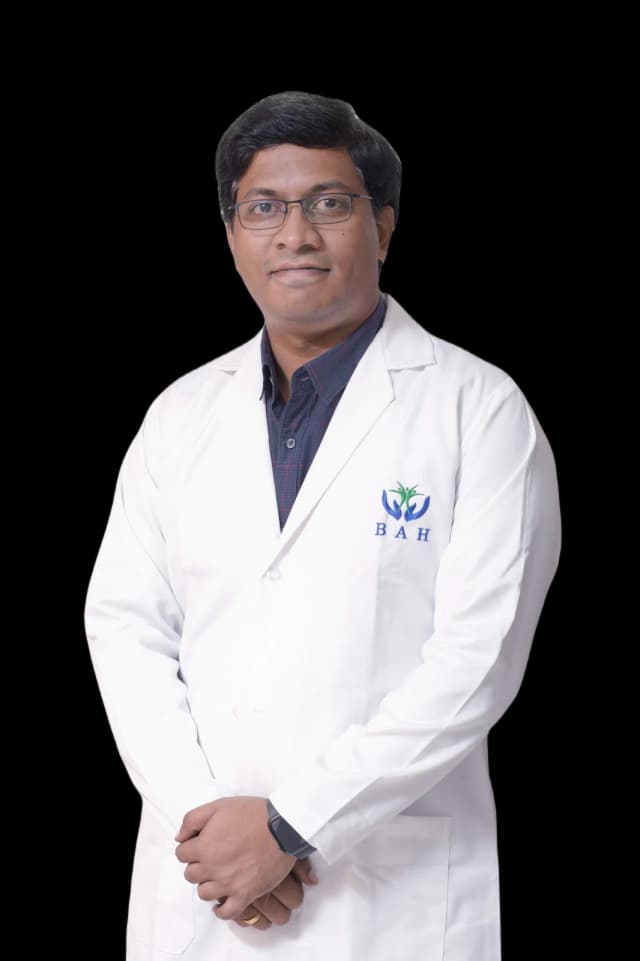 Dr. Mohan J